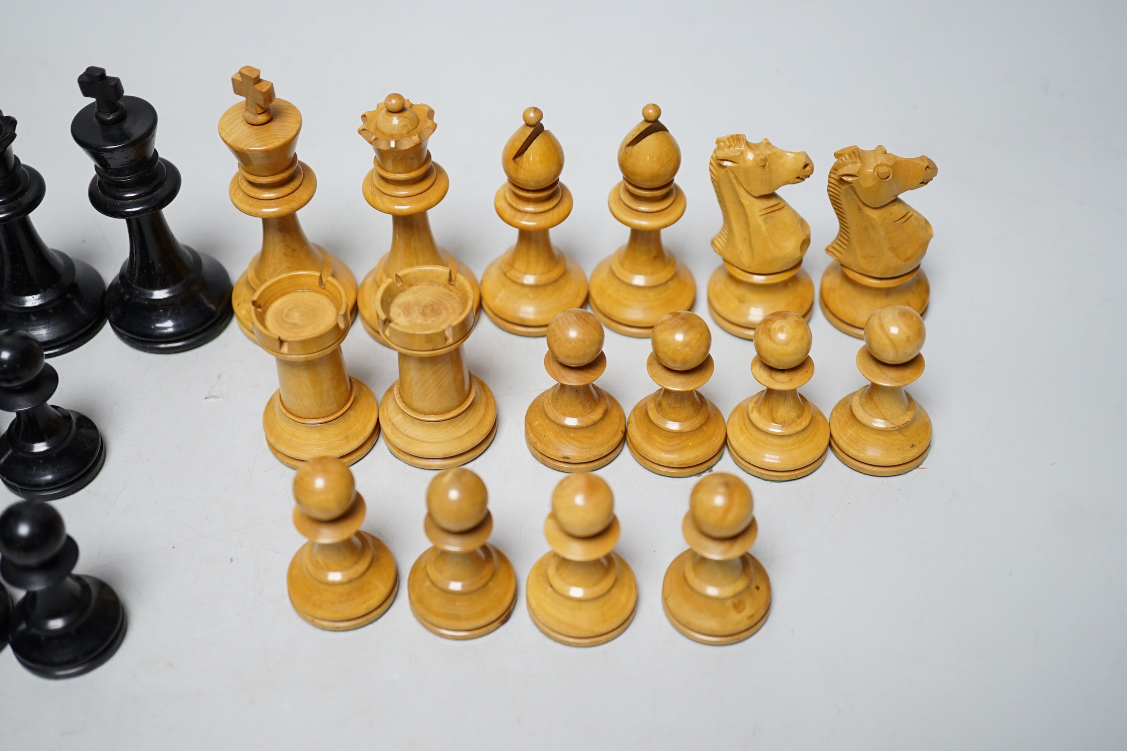 A Staunton pattern lead weighted part boxwood and ebony chess set, kings 8.3cm high (incomplete, lacking both black knights)